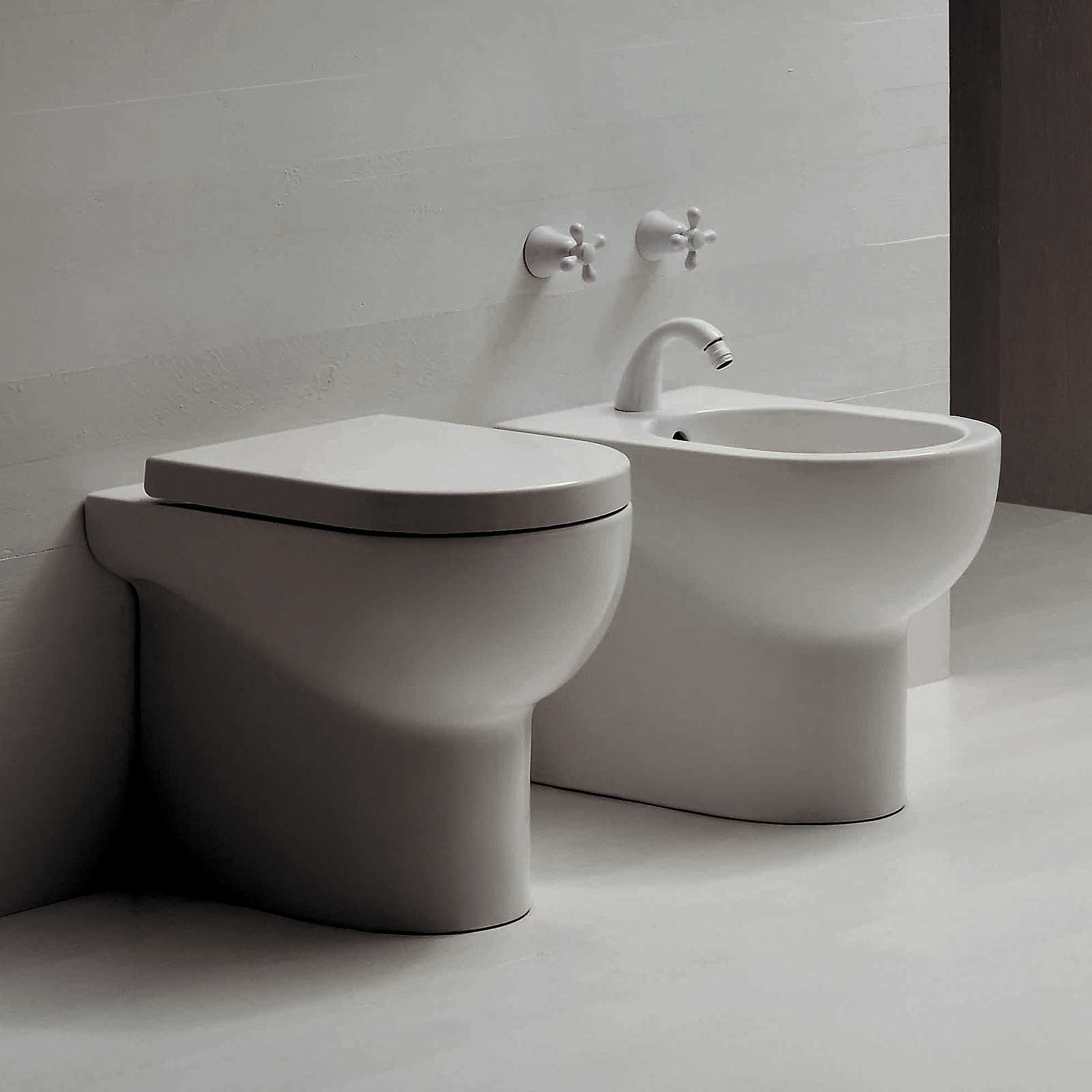 Lavabo Nuvola Azzurra Ceramica.Set Di Sanitari A Terra Filoparete Nuvola Di Azzurra Bidet Vaso E Coprivaso Dal Design Moderno